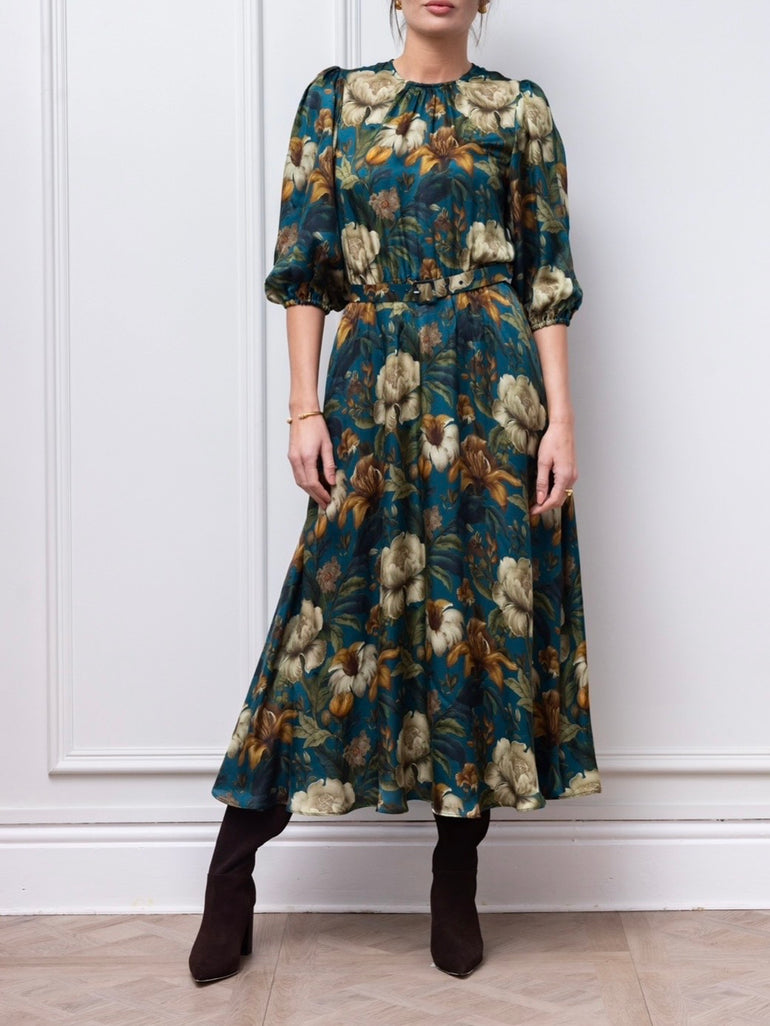 Full-length view of the Claire Mischevani Eira teal floral dress